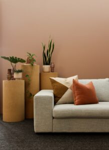 living room furniture with cushions and decor