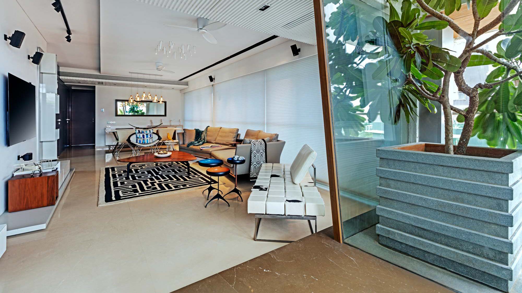 a room with plants, decor and furniture