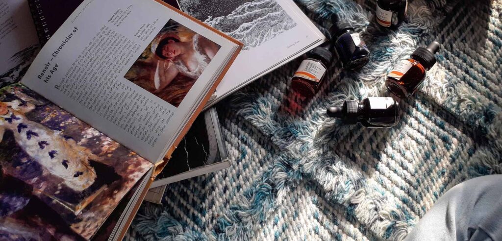 designer woven carpet with books strewn on it