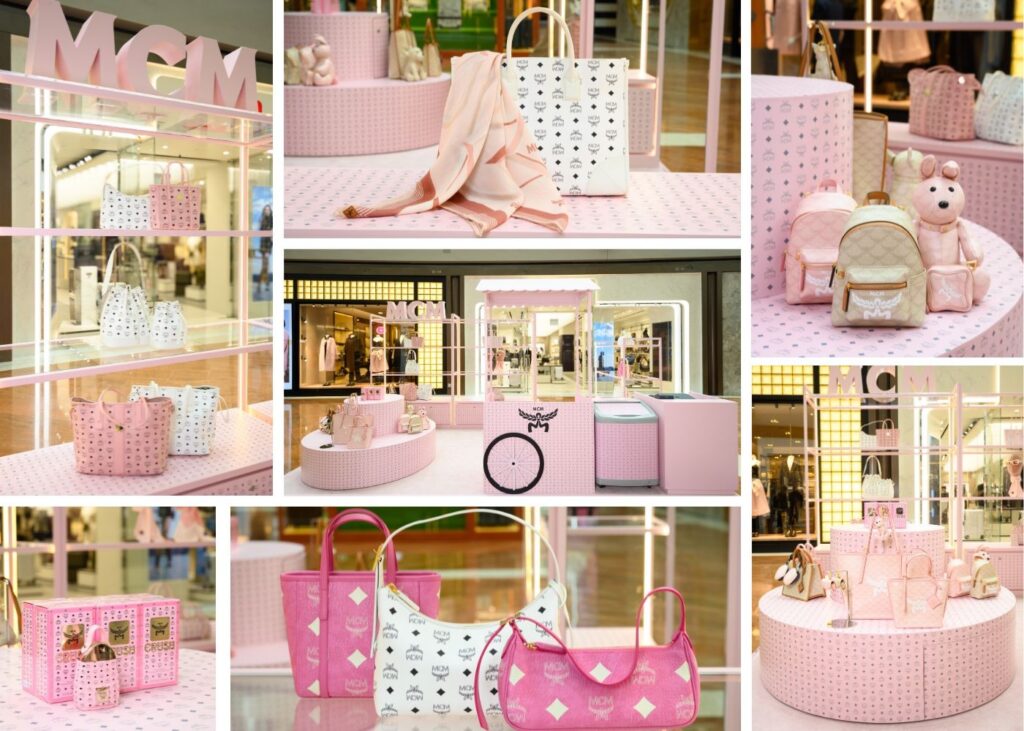 a pop up in pink hues showcasing designer bags