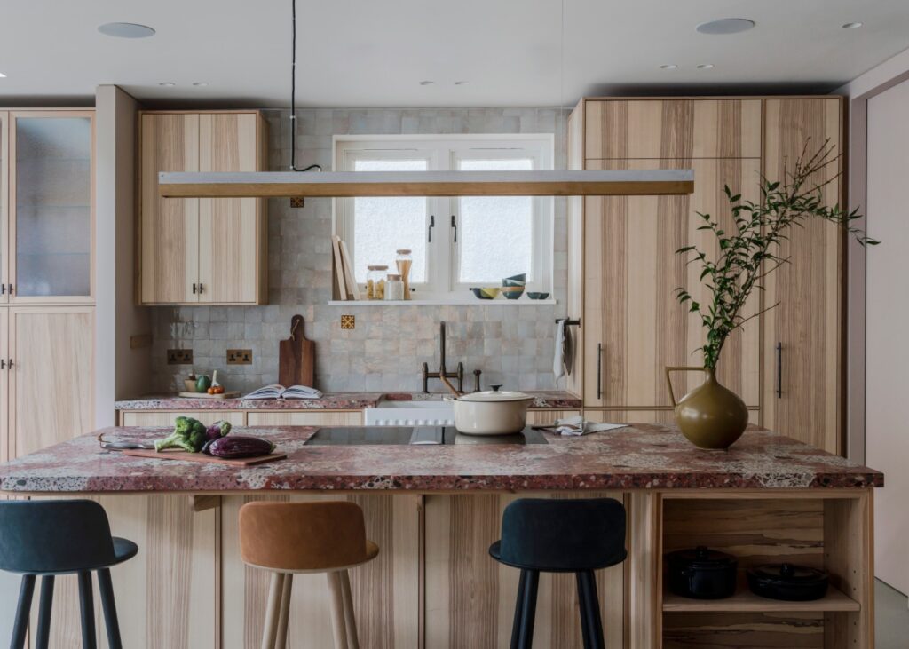 view of a kitchen and cooking island in a renovated London home