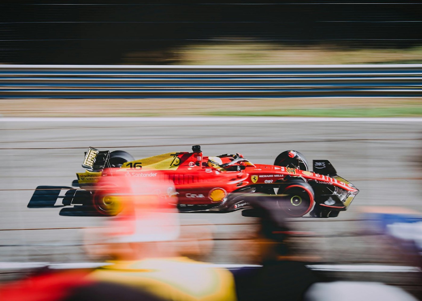 a red formula 1 car mid race