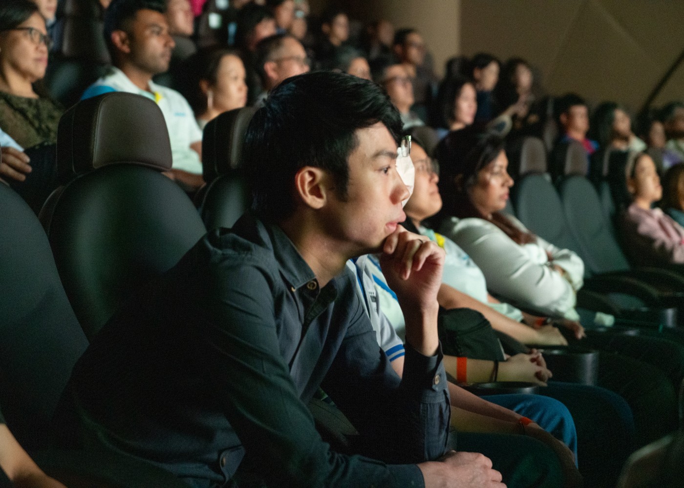 people sitting in a movie theatre