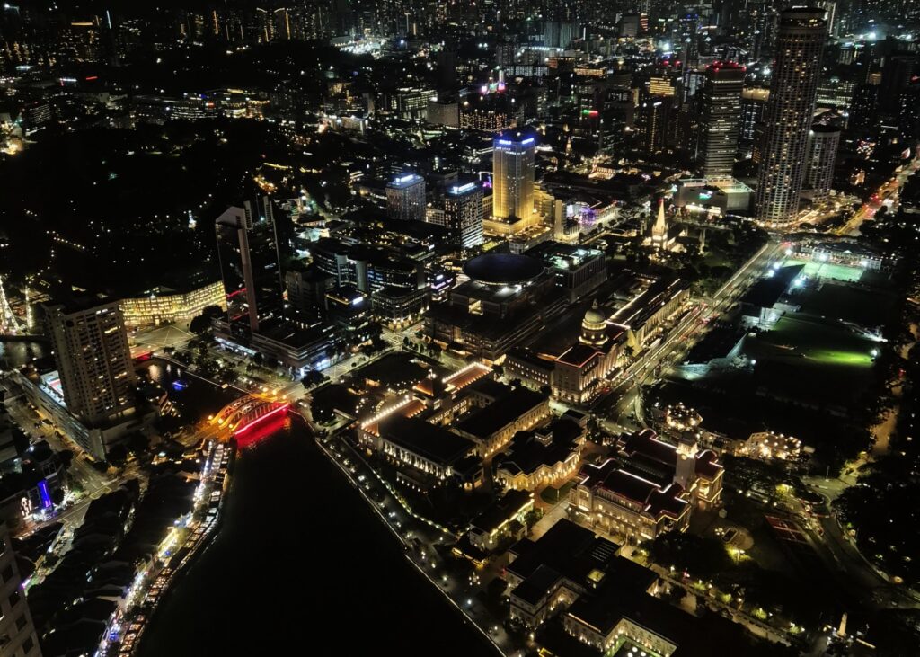 city view at night from a rooftop club in Singapore