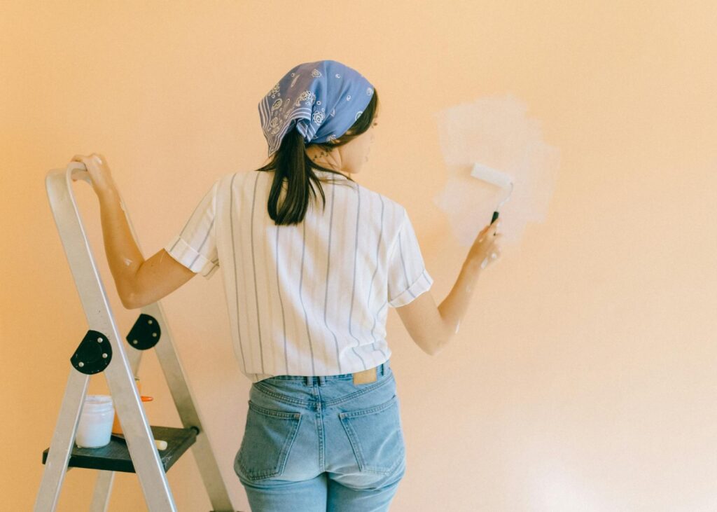 lady painting wall